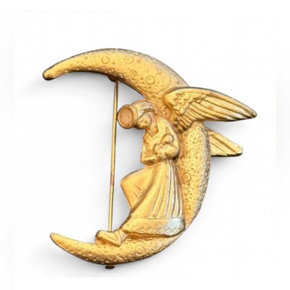 Vintage sleeping angel in a crescent moon brooch